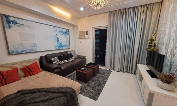 Bagumbayan Apartment | Aspire Tower at Nuvo City with FREE 1 parking slot