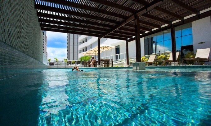 Caminho das Arvores Hotel | Astron Suítes Mondial Salvador by Nobile