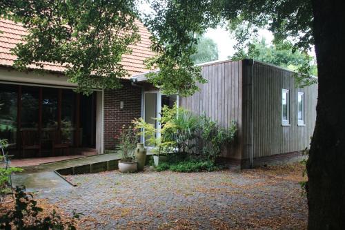 Heukelom Bed & Breakfast | B&B Even Heukelom - Kamer met Tuin