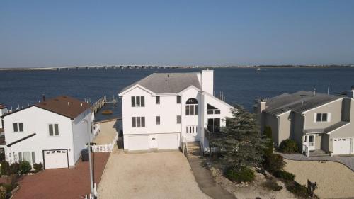 Beach Haven West House | Bay Front Home - Watch the sun rise over LBI. Pier for Boat/Swim/SUP/Kayak/Crab