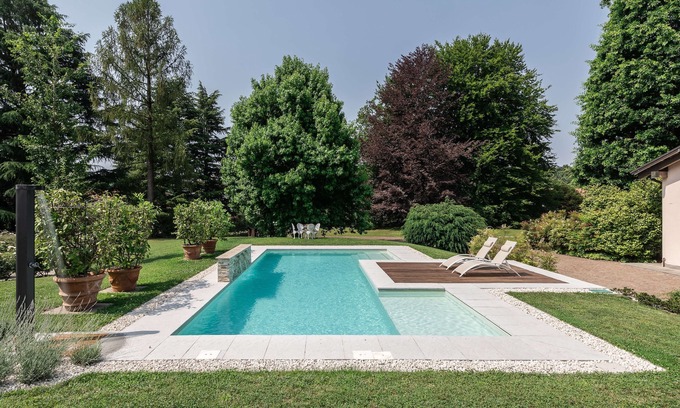 Beregazzo Con Figliaro Villa | Beautiful villa with pool surrounded by nature near Golf and Tennis courts