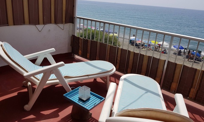 Algarrobo House | Black Cat House house on the beach with a large terrace and sea views.