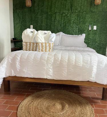 Buccoo Apartment | Botanic Garden Suite, with views of the nylon pool