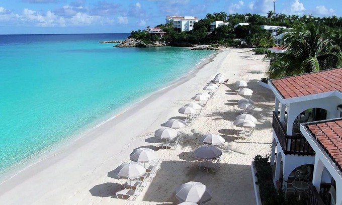 West End Village House | Breathtaking Sunset at Our Beach Front Stay | Living Area & Private Patio
