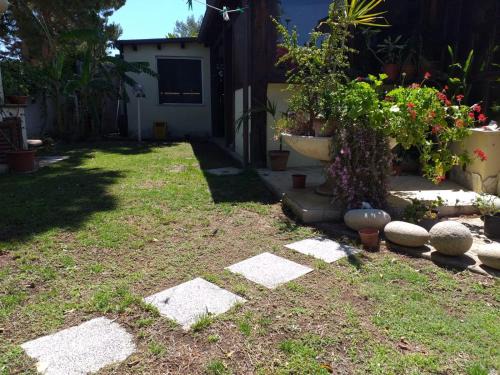 Quartu Sant'Elena Villa | Brezza di mare appartamento in Villa con giardino e spiaggia ,casa vacanze al mare