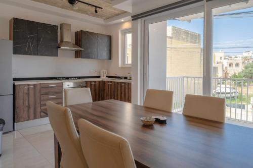 Sannat Apartment | Bright 3BR Getaway Spacious Airy & Family-Friendly