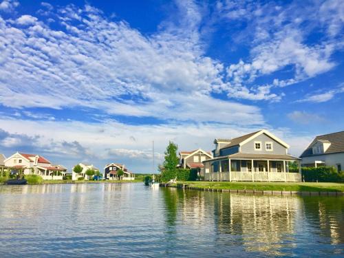 Municipality of Nissewaard House | Bungalow in Holland by Water with Sauna
