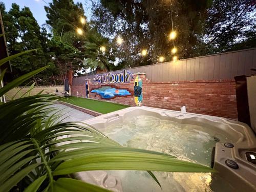 El Dorado House | CA4 House Family Oasis Golf Fire Pit & Games