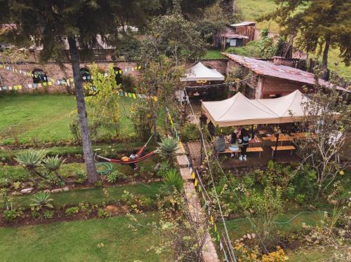 Banos del Inca House | Cabaña Kinti Yuraq en Kinti Wasi Hospedaje