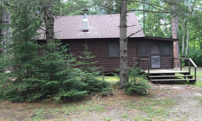Deer River Cabin | CABIN #4 (Bear) Beautiful knotty pine cabin tucked back by the woods!