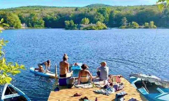 Camden Cottage | Camden cottage with float on water