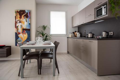Borgo Roma Apartment | Camelot Red - Appartamenti