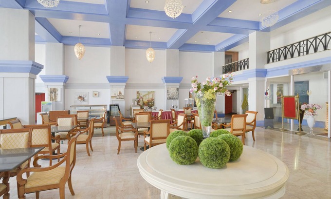 Aarey Colony Hotel | Capital O 44162 Royal Palms Hotel - Rose Collection