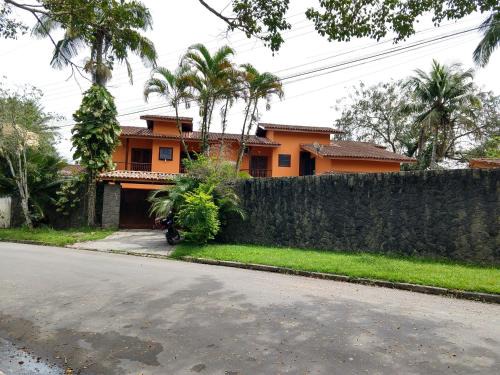 Estufa I House | Casa 5 suítes com piscina e churrasqueira