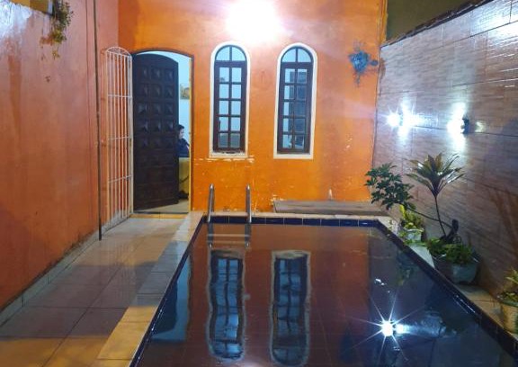 Aviacao House | Casa com piscina para temporada em Praia Grande