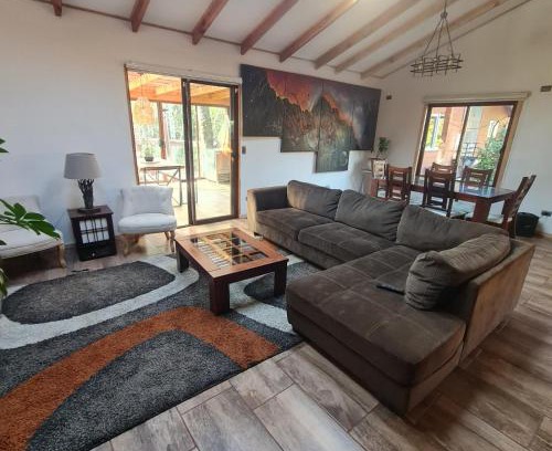 Pucon House | CASA CON TINAJA, PISCINA Y QUINCHO - Pucón