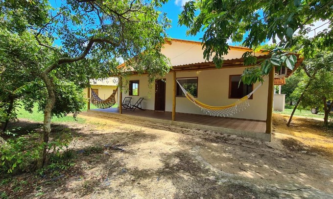 Caravelas House | Casa Marfim - Privacidade, charme e conforto à 50m do rio
