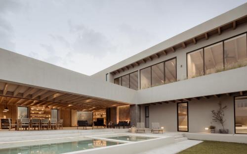 Tepeji del Rio Villa | Casa Pirules. Moderna y comoda casa con alberca caliente en club de golf!
