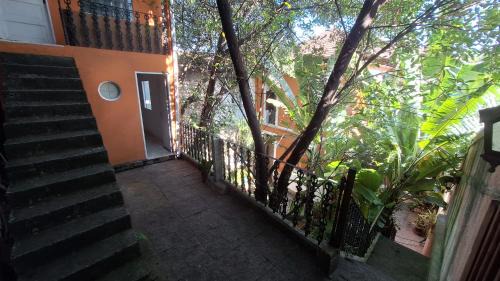 Santa Teresa House | Casinha Laranja