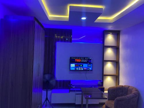Abeokuta Apartment | Cee&Tee ABEOKUTA 1BR-247Electricity - Solar Inverter AC in bedroom