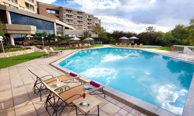 Maseru Hotel | Centrally Located Comfortable Accommodation! Outdoor Pool, Spa and Loungers!