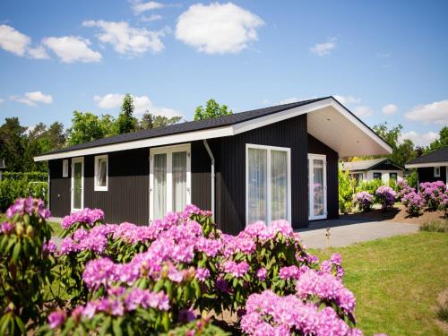 Municipality of Veldhoven Ski Chalet | Chalet in Netherlands by Scenic Pond