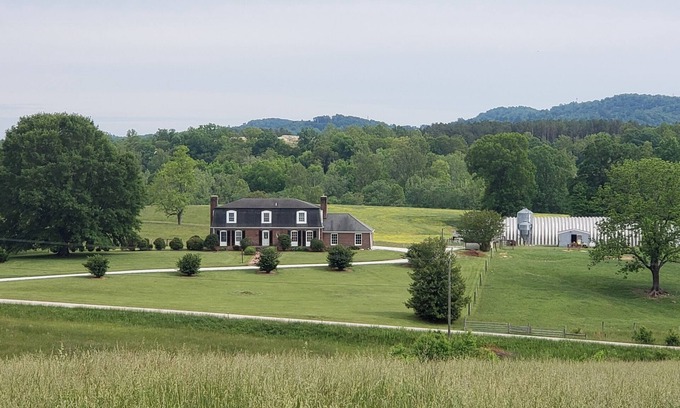 Lowesville Other | Charming 4-bedroom farmhouse in tranquil Lowesville with AC, WiFi