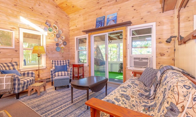 Norway Cabin | Charming Camp with an upstairs loft and wrap around deck. Near the Lake!