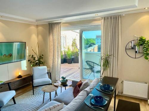 Skoyen Apartment | Charming central penthouse with big terrace