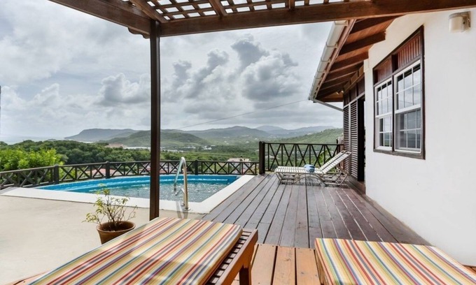 Cap Estate Cottage | Charming Cottage Located In Cap Estate - Orchid Cottage 1 Bedroom Home by RedAwning
