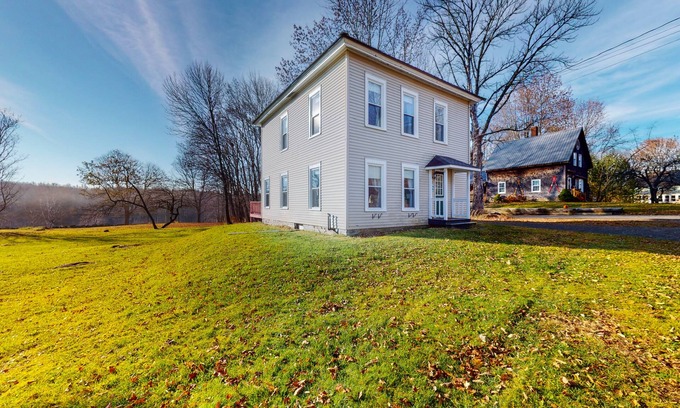 Monson House | Charming, lakefront dog-friendly home with a firepit, dock, & fast WiFi