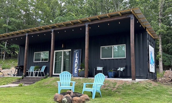 Cookson House | Charming shipping container home with lake view and boat ramp.