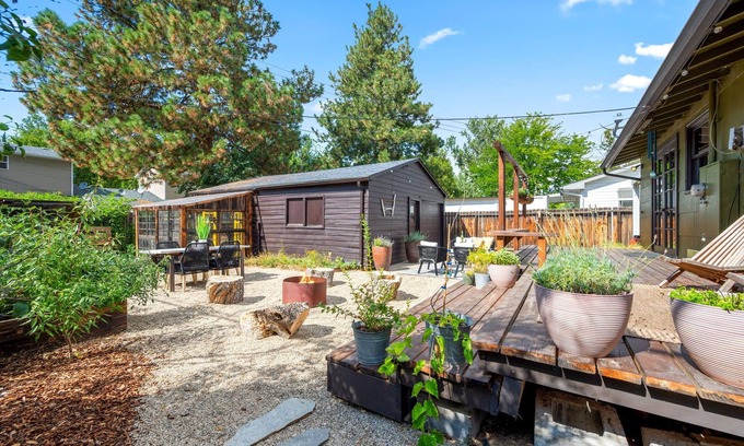 Depot Bench House | Charming Urban Ranch - garden oasis, fire pit in relaxing backyard