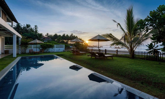 Gurupokuna Villa | Cheerful Beach Front 4 BR Villa with a Pool & Chef