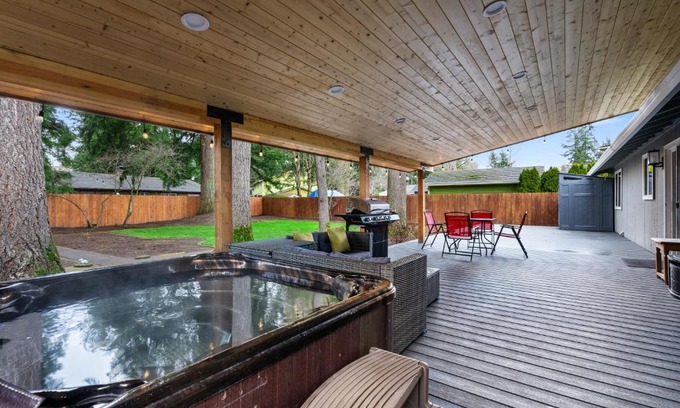 Evergreen House | Cheerful one level home with Hot Tub and Beautiful Yard