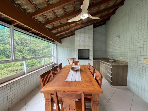 Praia Grande Apartment | Cobertura 3 suítes com Ar condicionado, 300 metros da Praia Grande, Piscina, Wi-fi, Sauna