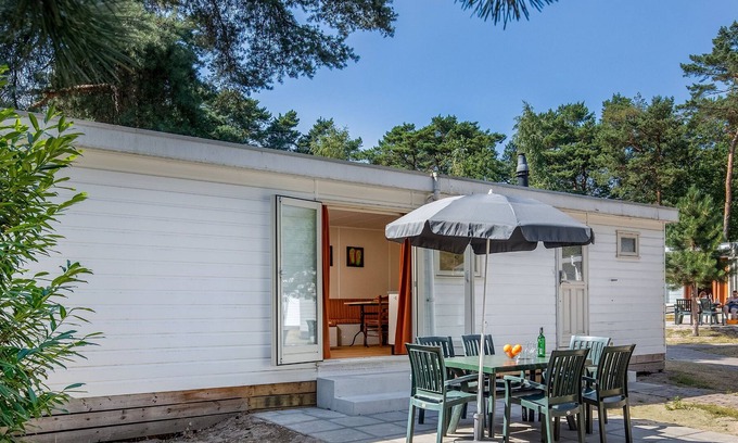 Municipality of Geldrop-Mierlo Cabin | Comfortable chalet with microwave in natural surroundings