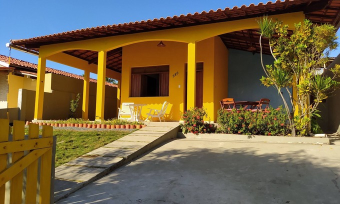 Sao Francisco House | Comfortable house with balcony and barbecue, avenue close to the sea