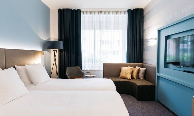 Weert Apartment | Comfortable Stay with Private Parking and Onsite Dining!