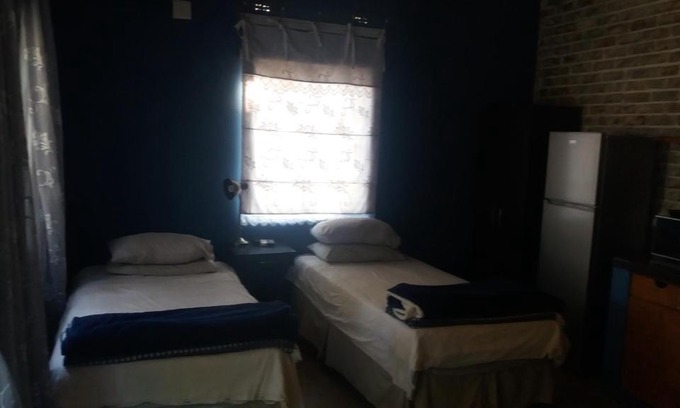 Lephalale House | Comfy room with dstv and aircon in convenient location