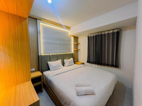 Sidoarjo Apartment | Compact and Relaxing 2BR at Suncity Residence Apartment By Travelio