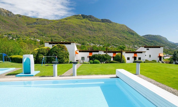 Capriasca Apartment | Cosy apartment for 5 guests with WIFI, pool, TV, patio, pets allowed and panoramic view