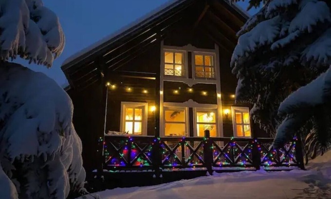 Allos Ski Chalet | Cosy detached Alpine chalet with log fire, balcony and mountain views - sleeps 8