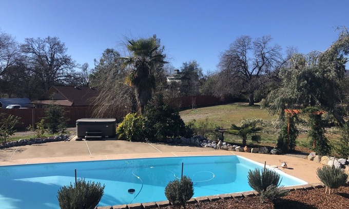 Redding House | Country oasis with shared swimming pool & hot tub, back yard/deck