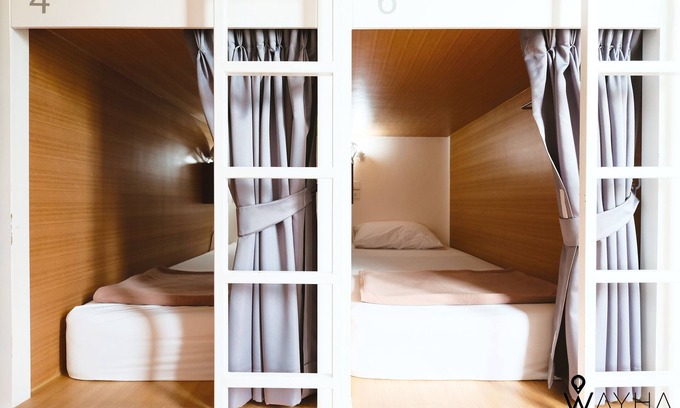 Lak Si Hotel | Cozy Capsule Dorms With a Shared Kitchen and a Social Area