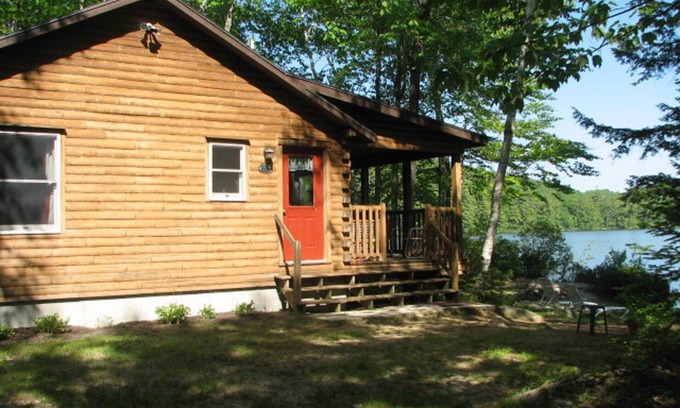 Norway Cabin | Cozy Cedar Log Cabin on Pristine Sand Pond in Norway, great for swimming.