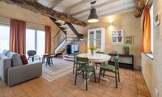 Cressa Apartment | Cozy Loft Apartment in Restored Farmhouse