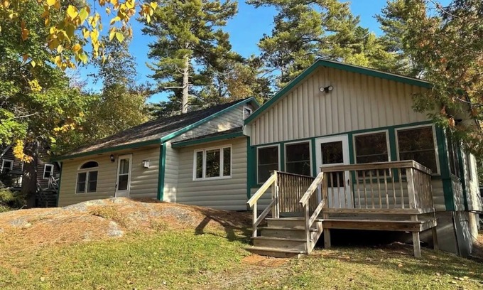 Lucerne-in-Maine Cabin | Cozy Log Home across from Phillips Lake-Four Season Fun