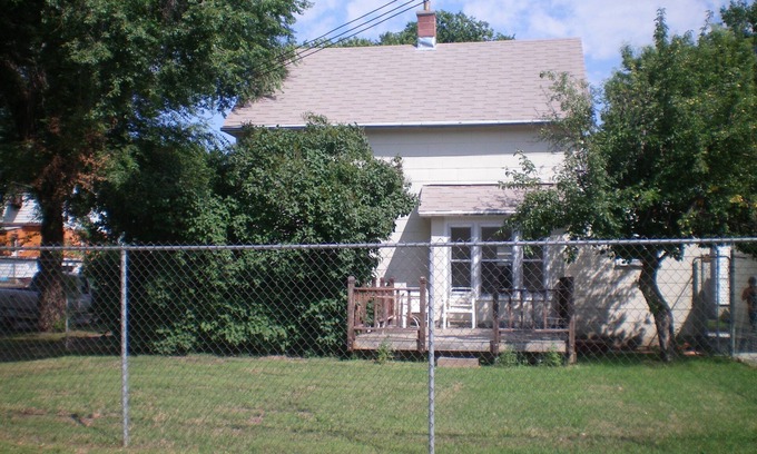Minot House | Cozy Nostalgic 2 bedroom, 1 1/2 Bath 2 Story Home With fence, deck & garage.