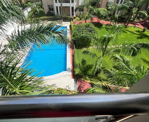 Msasani Apartment | Cozy & Spacious 3BR Near Beach With Pool & Gym